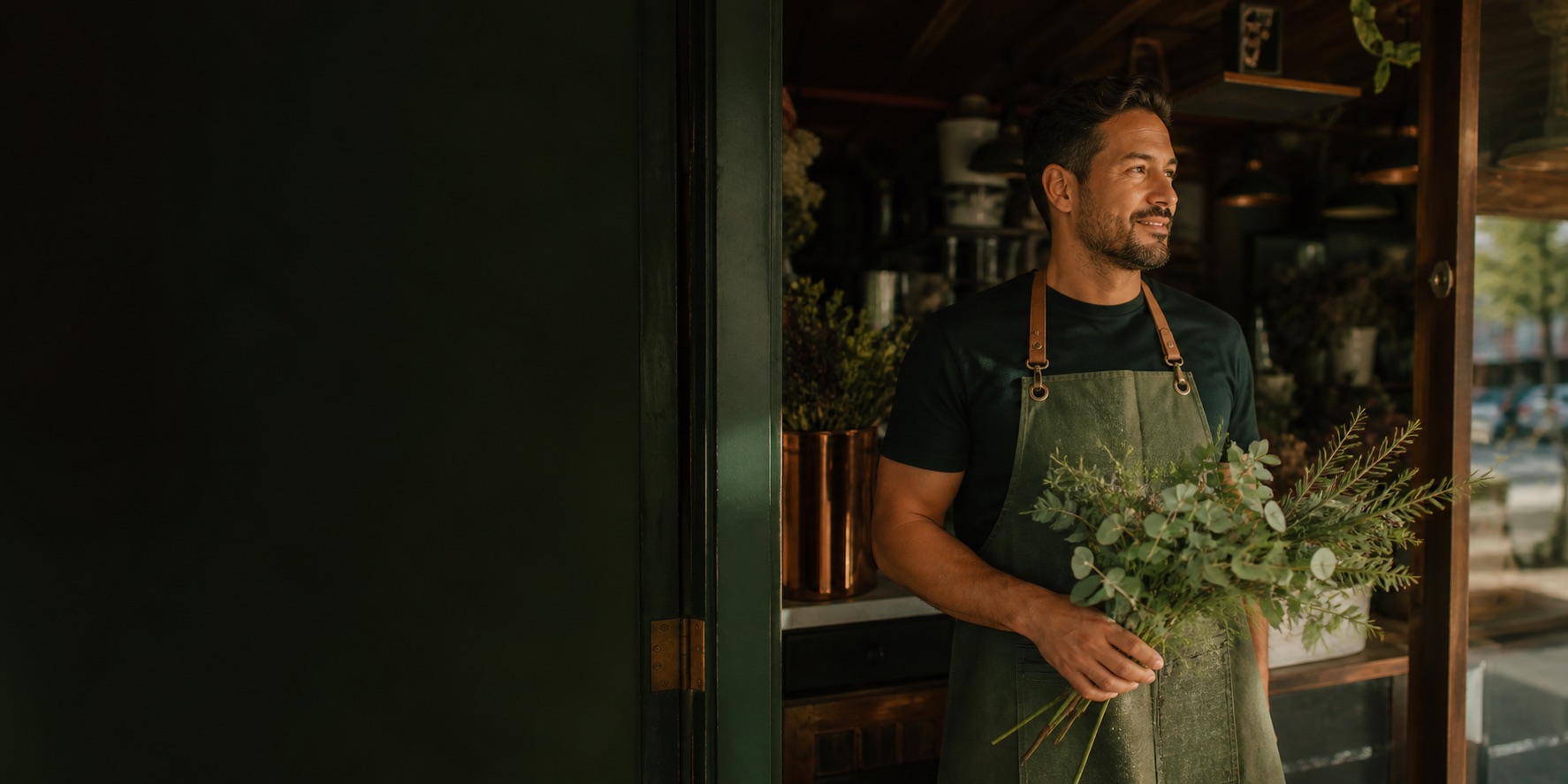 A Houston small-business owner standing in his neighborhood shop